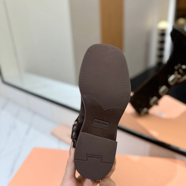 THICK-SOLED BUCKLE BOOTS IN BLACK SUEDE