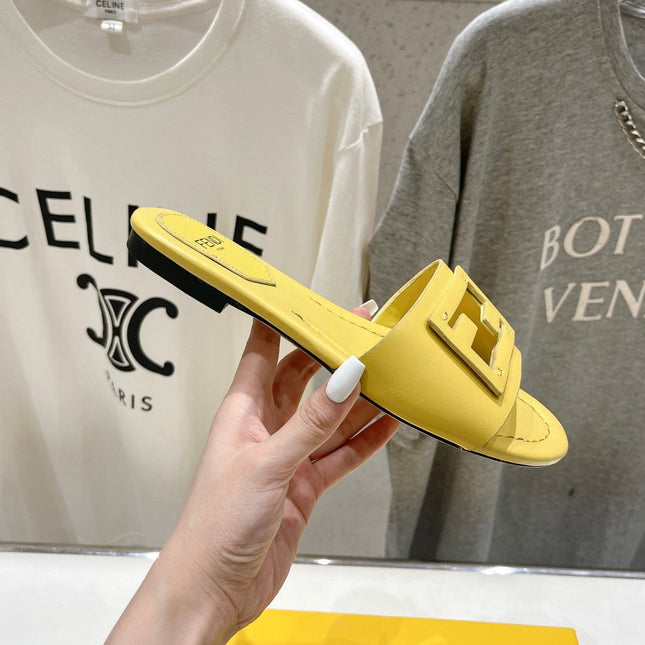 FENDI BAGUETTE SLIDES IN BRIGHT YELLOW LAMBSKIN