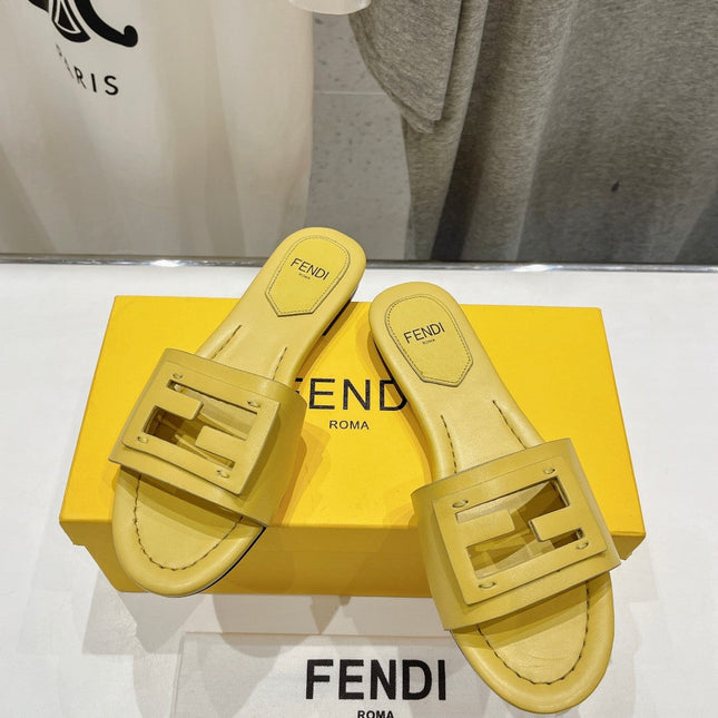 FENDI BAGUETTE SLIDES IN BRIGHT YELLOW LAMBSKIN