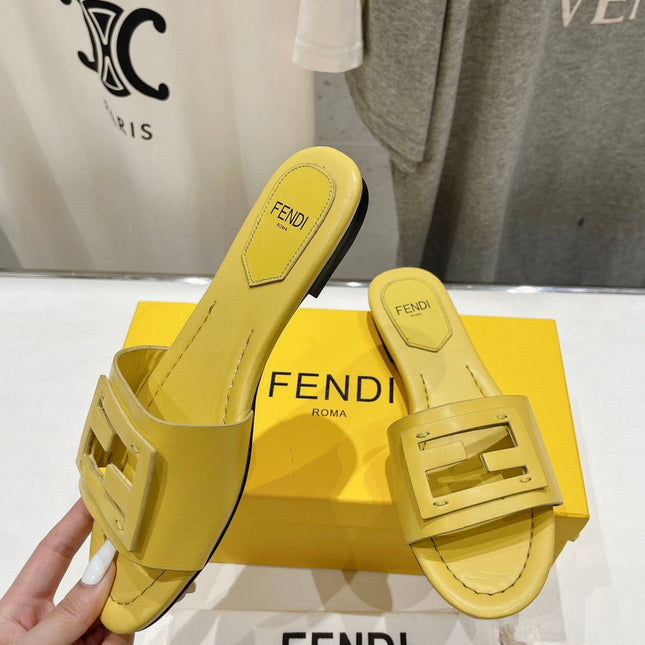 FENDI BAGUETTE SLIDES IN BRIGHT YELLOW LAMBSKIN