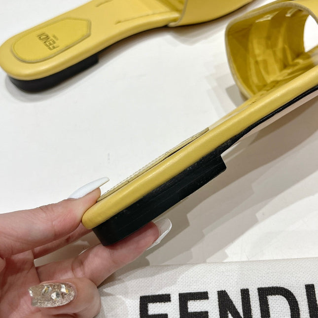 FENDI BAGUETTE SLIDES IN BRIGHT YELLOW LAMBSKIN