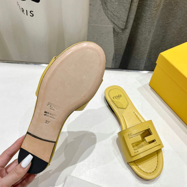 FENDI BAGUETTE SLIDES IN BRIGHT YELLOW LAMBSKIN