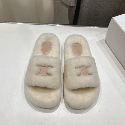 THICK-SOLED SLIPPER IN WHITE LAMB FUR