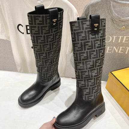 FENDI 25S HIGH BOOTS IN BLACK COWHIDE AND CANVAS LOGO EMBOSSING