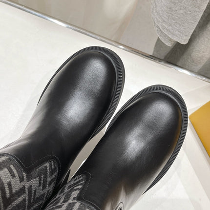 FENDI 25S HIGH BOOTS IN BLACK COWHIDE AND CANVAS LOGO EMBOSSING