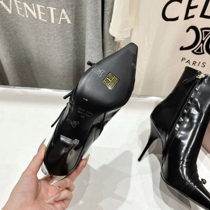 HIGH HEEL POINTED-TOE BOOTS IN BLACK SHINY LAMBSKIN