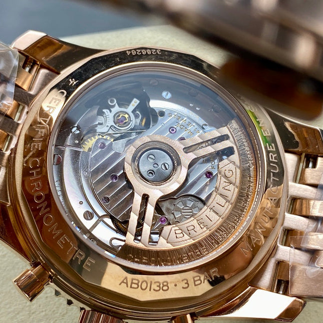 NAVITIMER B01 CHRONOGRAPH 43 ALL RED GOLD BLACK MIX GREEN DIAL