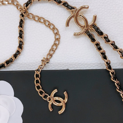 CHAIN BELT IN GOLD METAL INTERWOVEN WITH CALFSKIN STRAPS