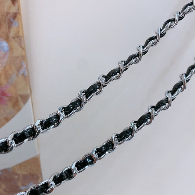 CHAIN BELT IN SILVER METAL INTERWOVEN WITH CALFSKIN STRAPS