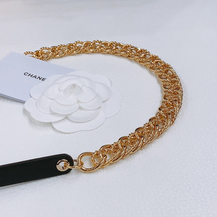 TWISTED GOLD CHAIN BELT IN GOLD METAL BLACK CALFSKIN GOLD BUCKLE