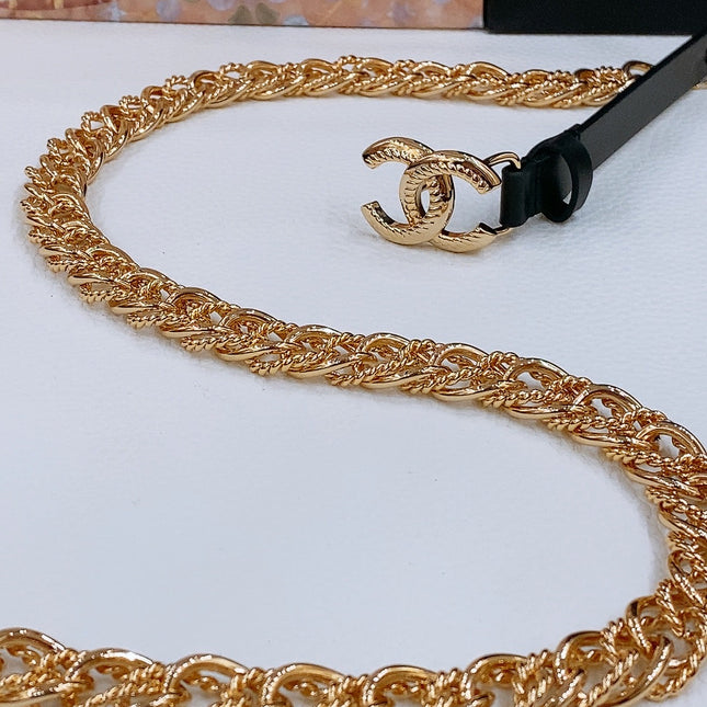 TWISTED GOLD CHAIN BELT IN GOLD METAL BLACK CALFSKIN GOLD BUCKLE