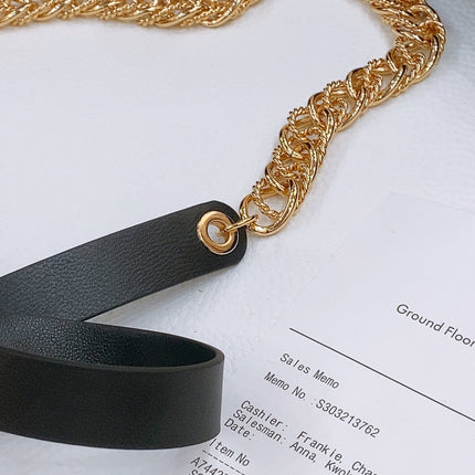 RIBBED BOW WAIST CHAIN IN GOLD TONE BRASS AND BLACK LAMBSKIN
