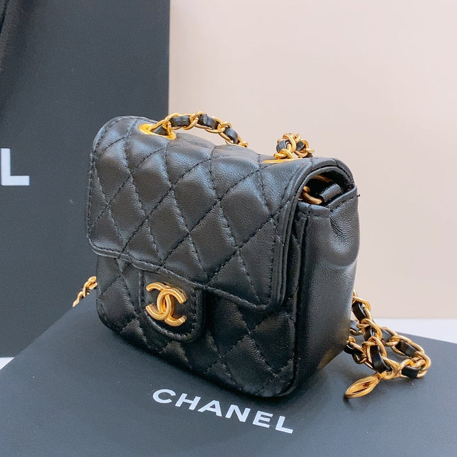 CHAIN BELT WITH GOLD METAL BLACK CALFSKIN INTERLINKING STRAPS AND MINI BAG