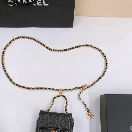 CHAIN BELT WITH GOLD METAL BLACK CALFSKIN INTERLINKING STRAPS AND MINI BAG