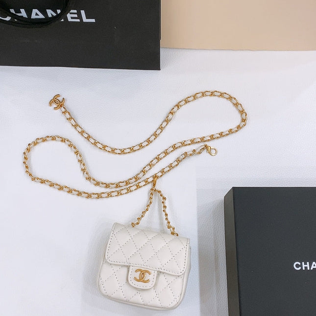 CHAIN BELT WITH GOLD METAL WHITE CALFSKIN INTERLINKING STRAPS AND MINI BAG ATTACHMENT