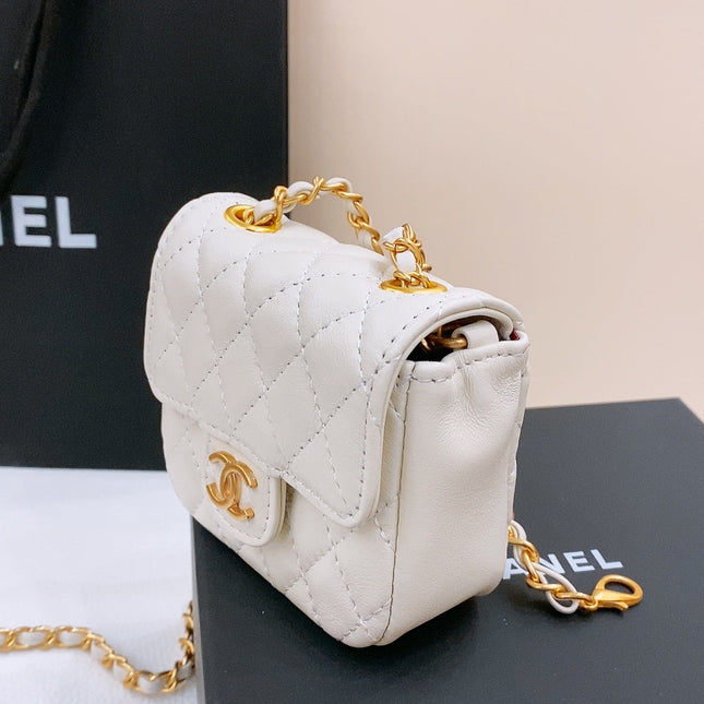 CHAIN BELT WITH GOLD METAL WHITE CALFSKIN INTERLINKING STRAPS AND MINI BAG ATTACHMENT