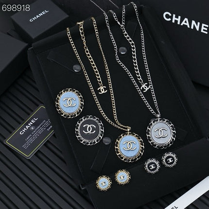CC 25P STUD EARRINGS IN BLUE DENIM BLACK CALFSKIN-THREADED BUTTON