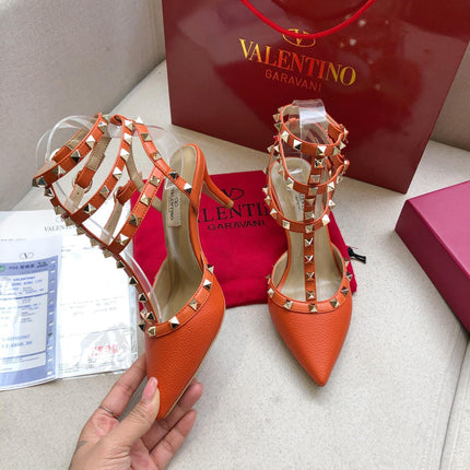 ROCKSTUD FIRE ORANGE METALLIC CALFSKIN ANKLE STRAP HIGH SANDAL