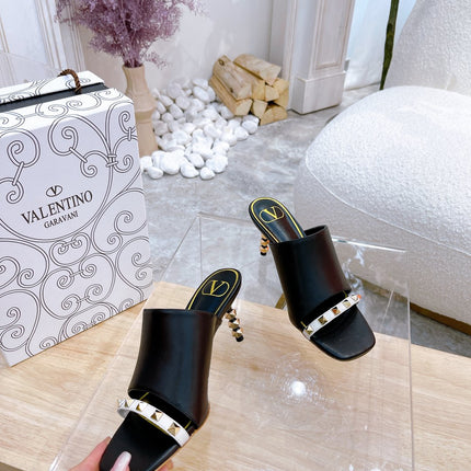 ROCKSTUD TOWER-HEEL MULES IN BLACK CALFSKIN 7 CM