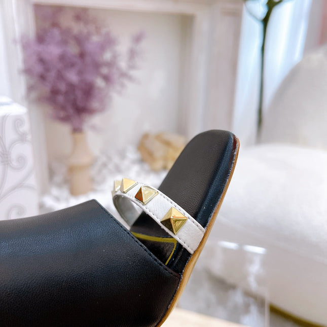 ROCKSTUD TOWER-HEEL MULES IN BLACK CALFSKIN 7 CM