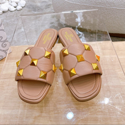 STUD FLAT SLIDE IN PEANUT BROWN LAMBSKIN