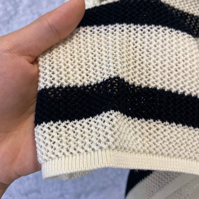 Black and beige hollow knitted vest