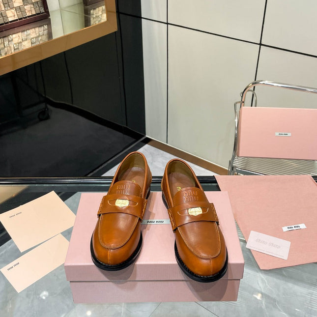 PENNY LOAFERS IN BRONZE BROWN CALFSKIN