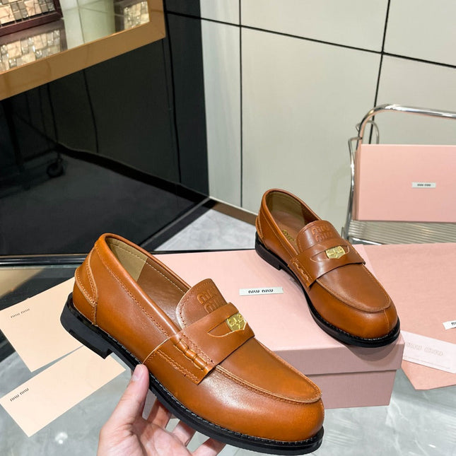 PENNY LOAFERS IN BRONZE BROWN CALFSKIN