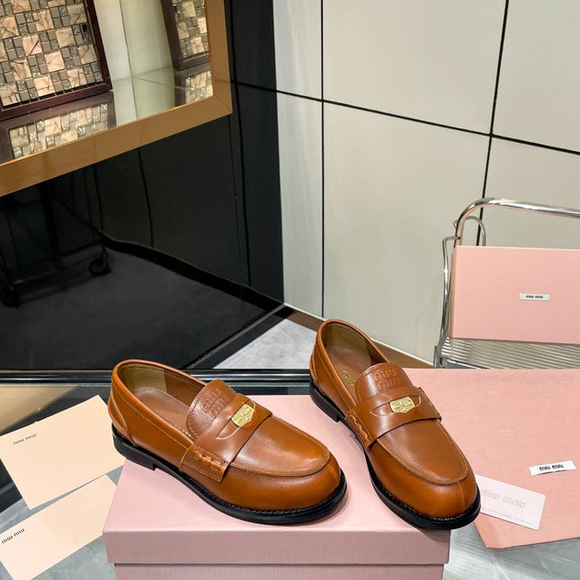 PENNY LOAFERS IN BRONZE BROWN CALFSKIN